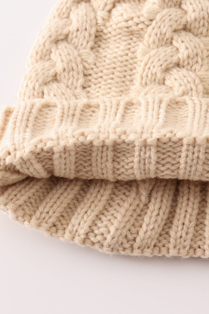 Beige pompom cable beanie