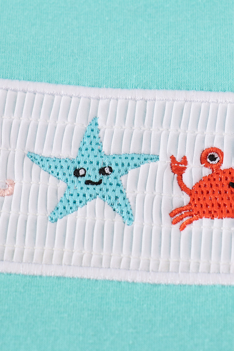 Blue marine creature embroidery smocked top